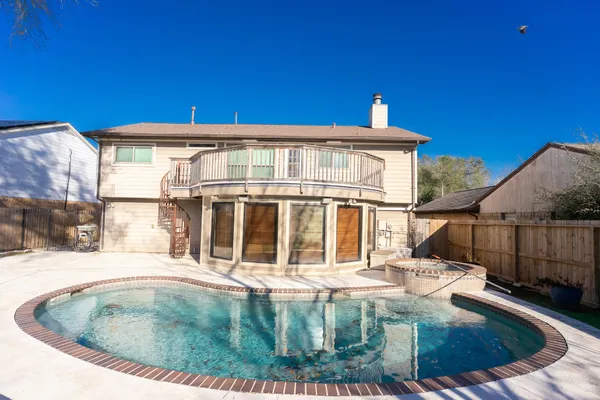 a view of a house with pool