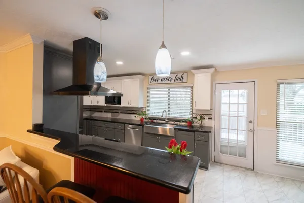 a view of balcony with a small yard