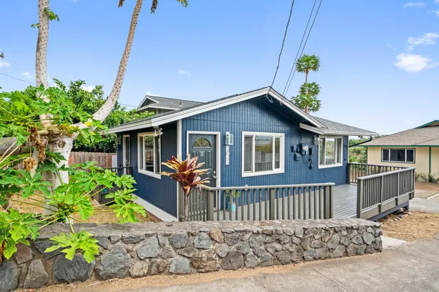 a front view of a house with a porch