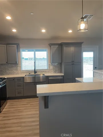 a view of room with a ceiling fan and window