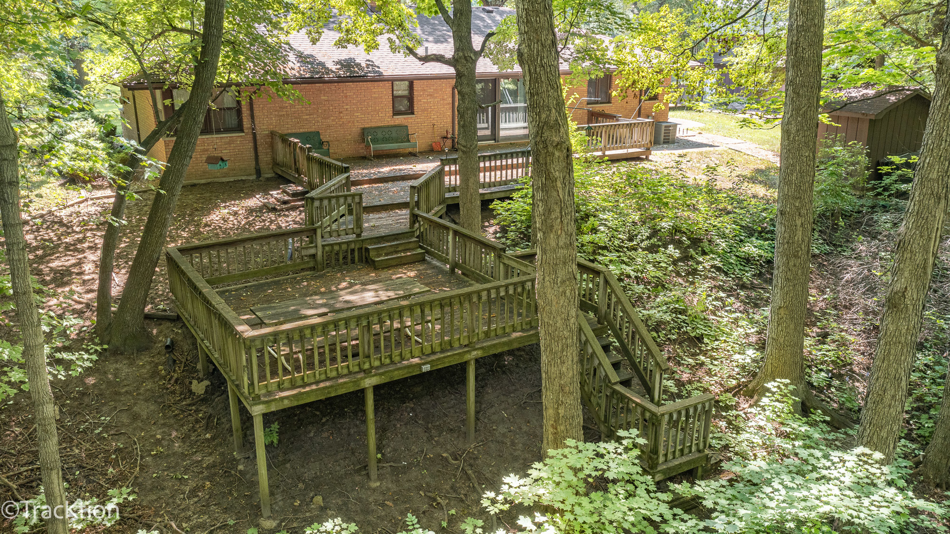 2982 Whitetie Road Morris, IL 60450 - Photo 16 of 19 a view of a small yard with plants and large tree