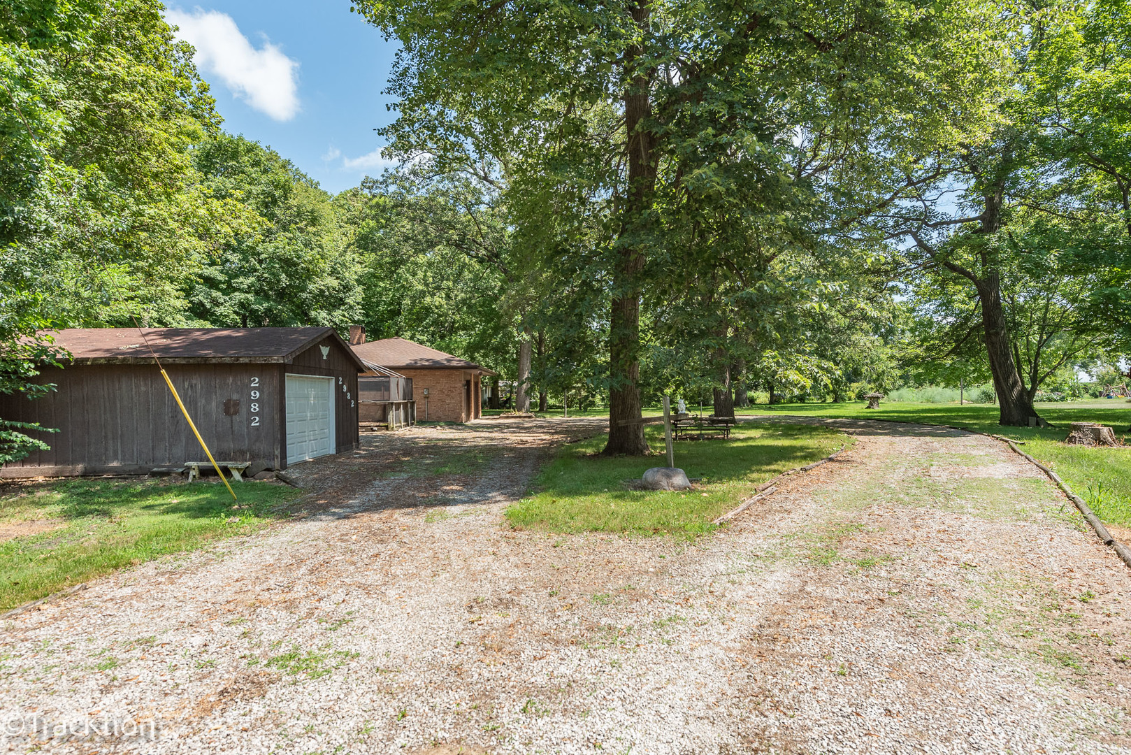 2982 Whitetie Road Morris, IL 60450 - Photo 2 of 19 a backyard of a house with yard and trampoline