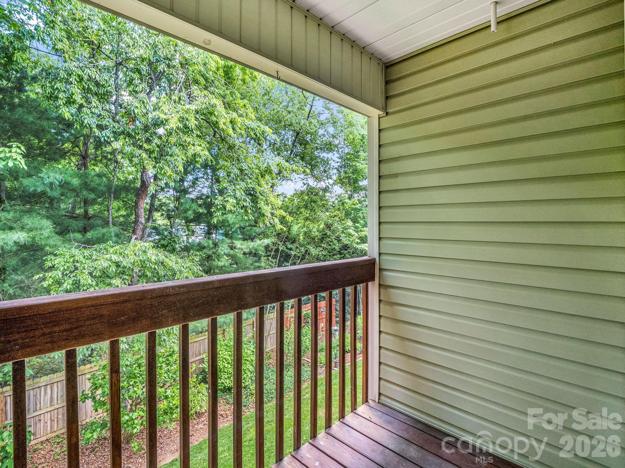 4 Rathfarnham Road, Unit 4F Asheville, NC 28803 - Photo 23 of 33 a view of a balcony with wooden floor