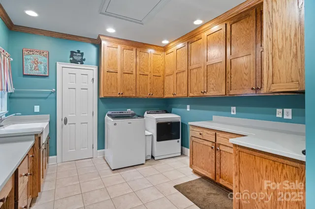 a kitchen with a stove a sink and a refrigerator
