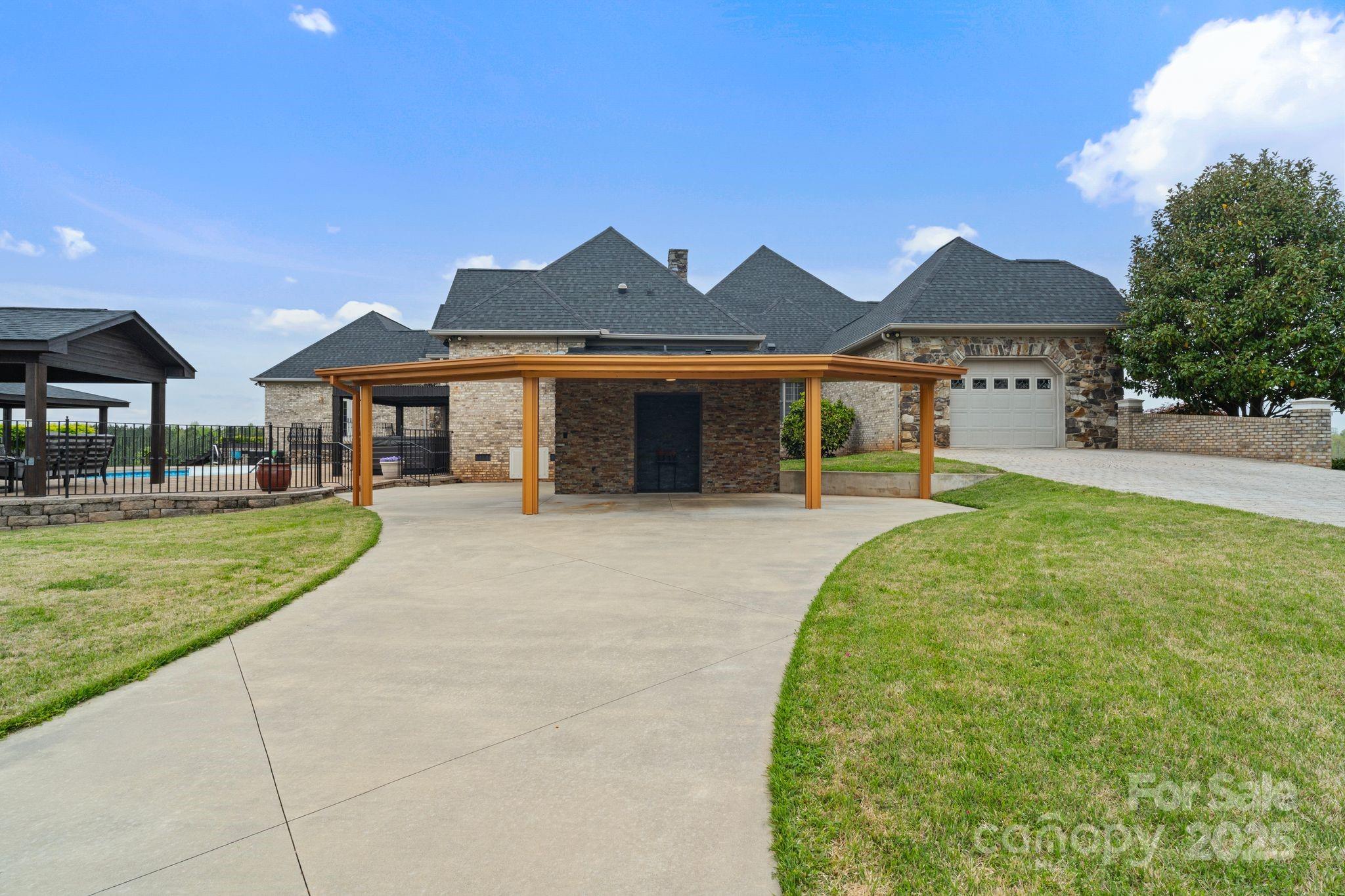 265 Philip Henderson Road Rutherfordton, NC 28139 - Photo 26 of 40 a front view of a house with a yard