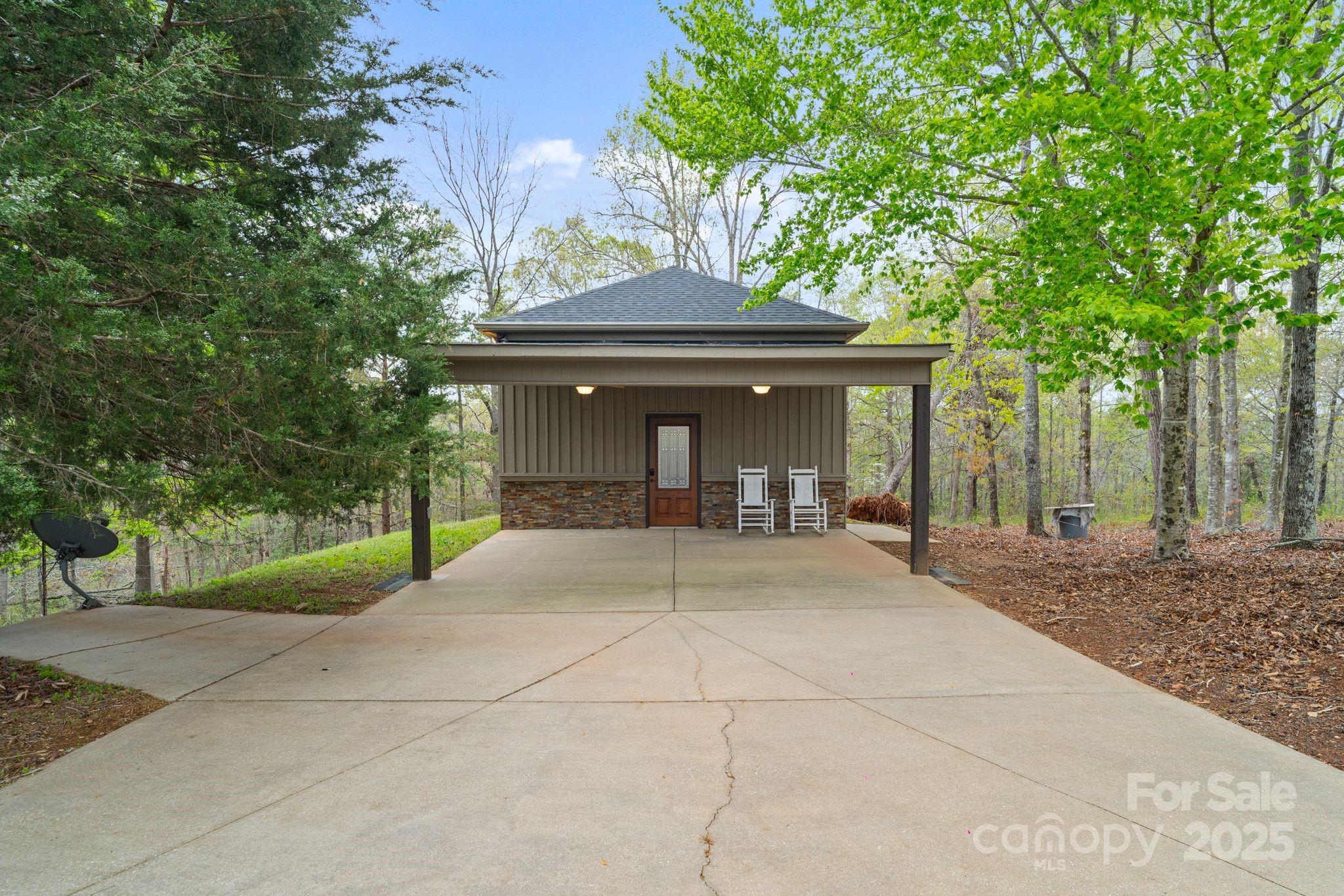 265 Philip Henderson Road Rutherfordton, NC 28139 - Photo 28 of 40 a view of house with a outdoor space