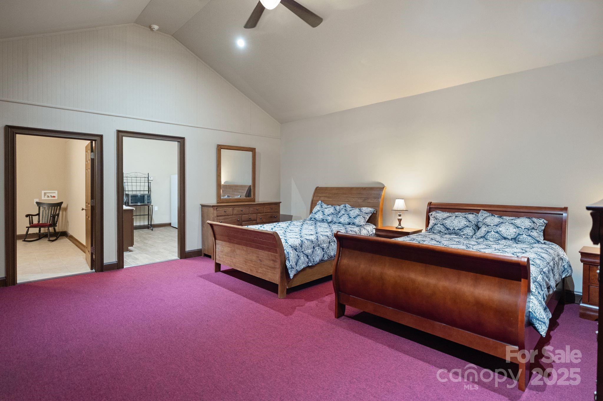 265 Philip Henderson Road Rutherfordton, NC 28139 - Photo 36 of 40 a bedroom with a bed and a view of living room