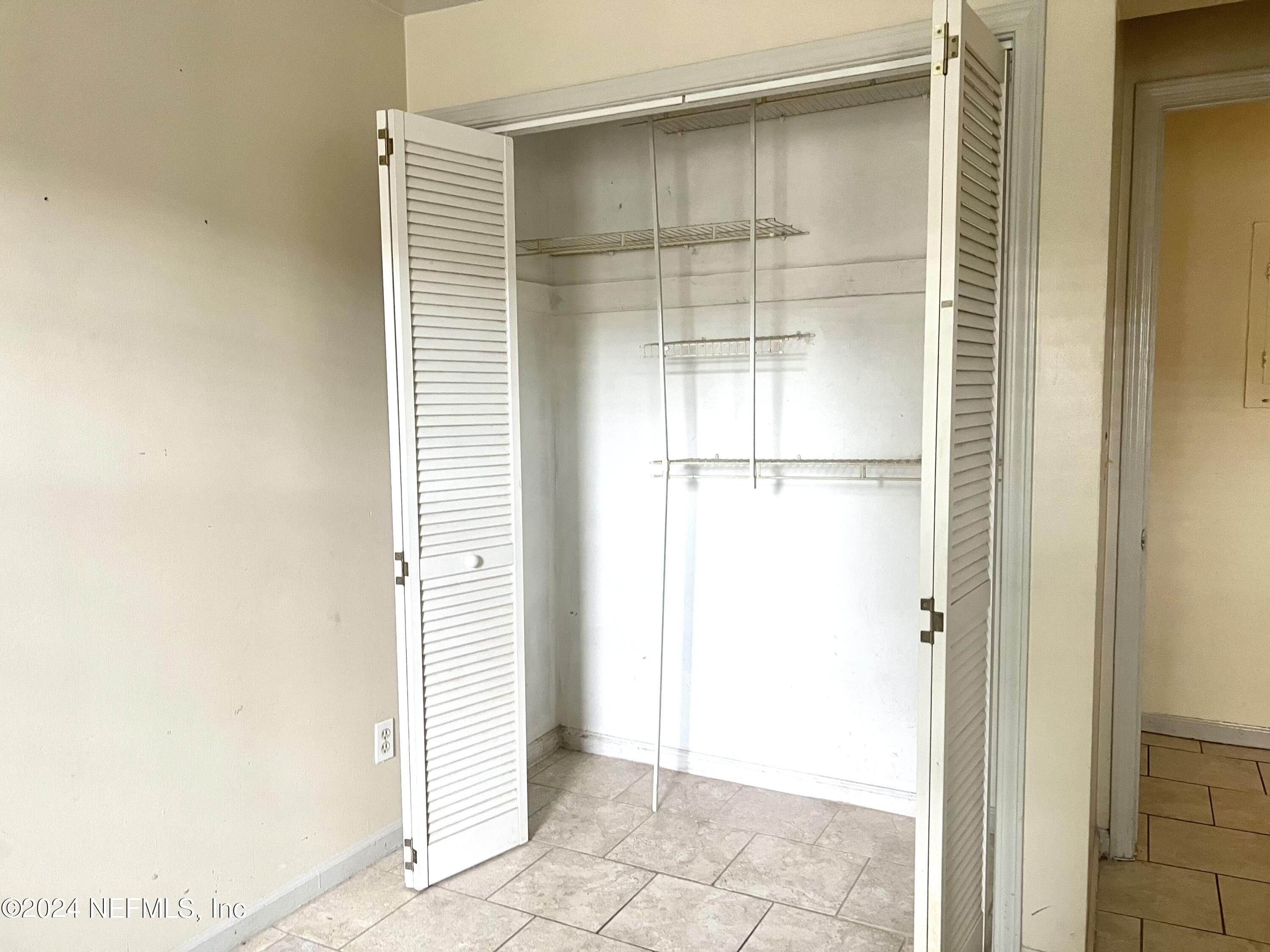 1631 El Prado Road, Unit 4 Jacksonville, FL 32216 - Photo 16 of 23 a view of a small space with wooden floor and a window