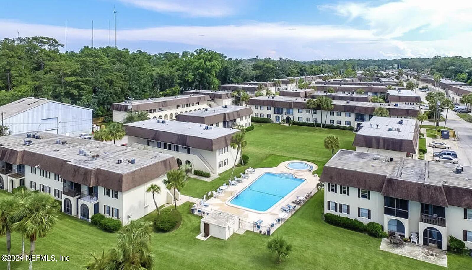 1631 El Prado Road, Unit 4 Jacksonville, FL 32216 - Photo 20 of 23 an aerial view of a house with a big yard