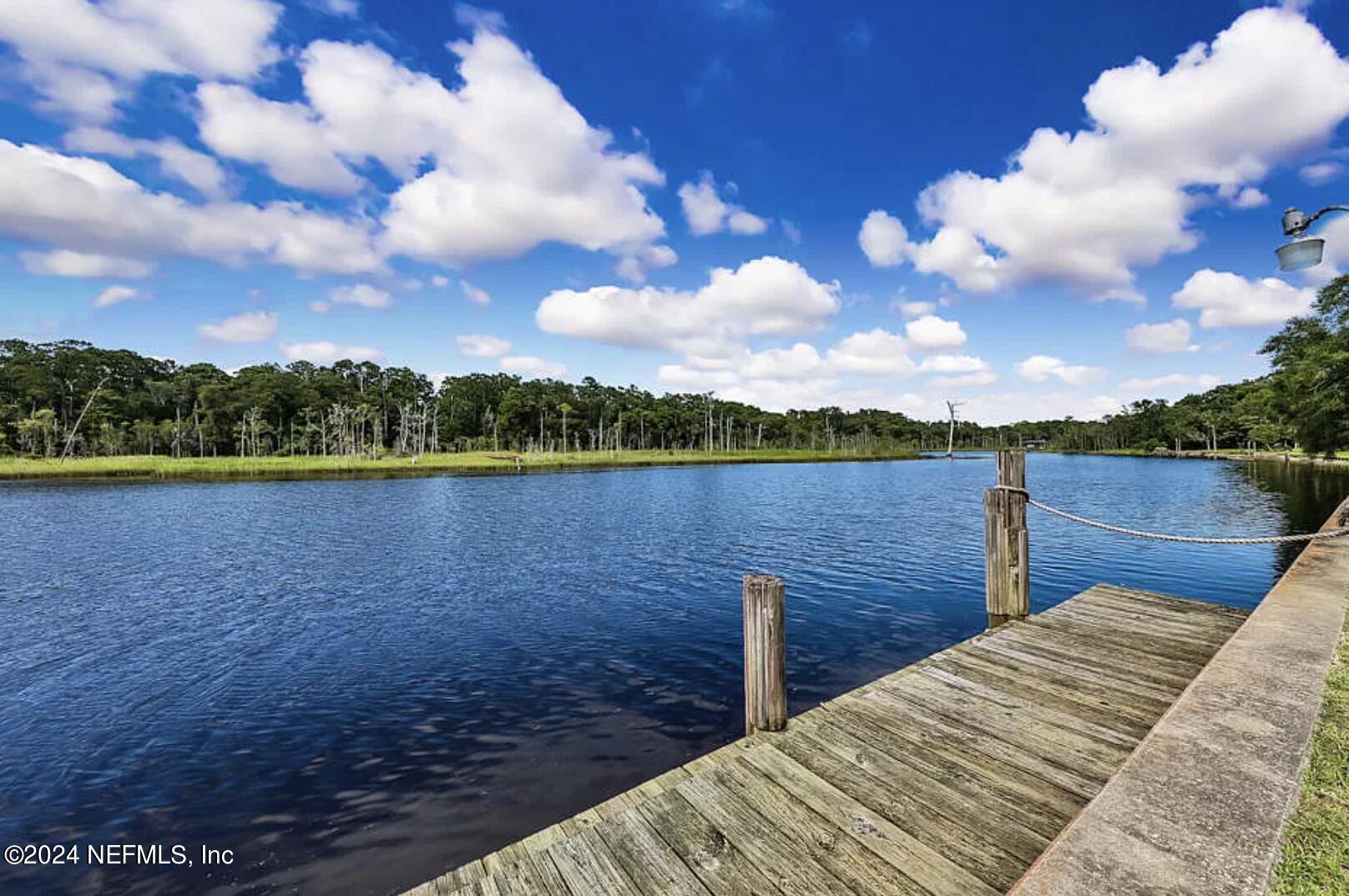 1631 El Prado Road, Unit 4 Jacksonville, FL 32216 - Photo 22 of 23 a view of a lake from a balcony