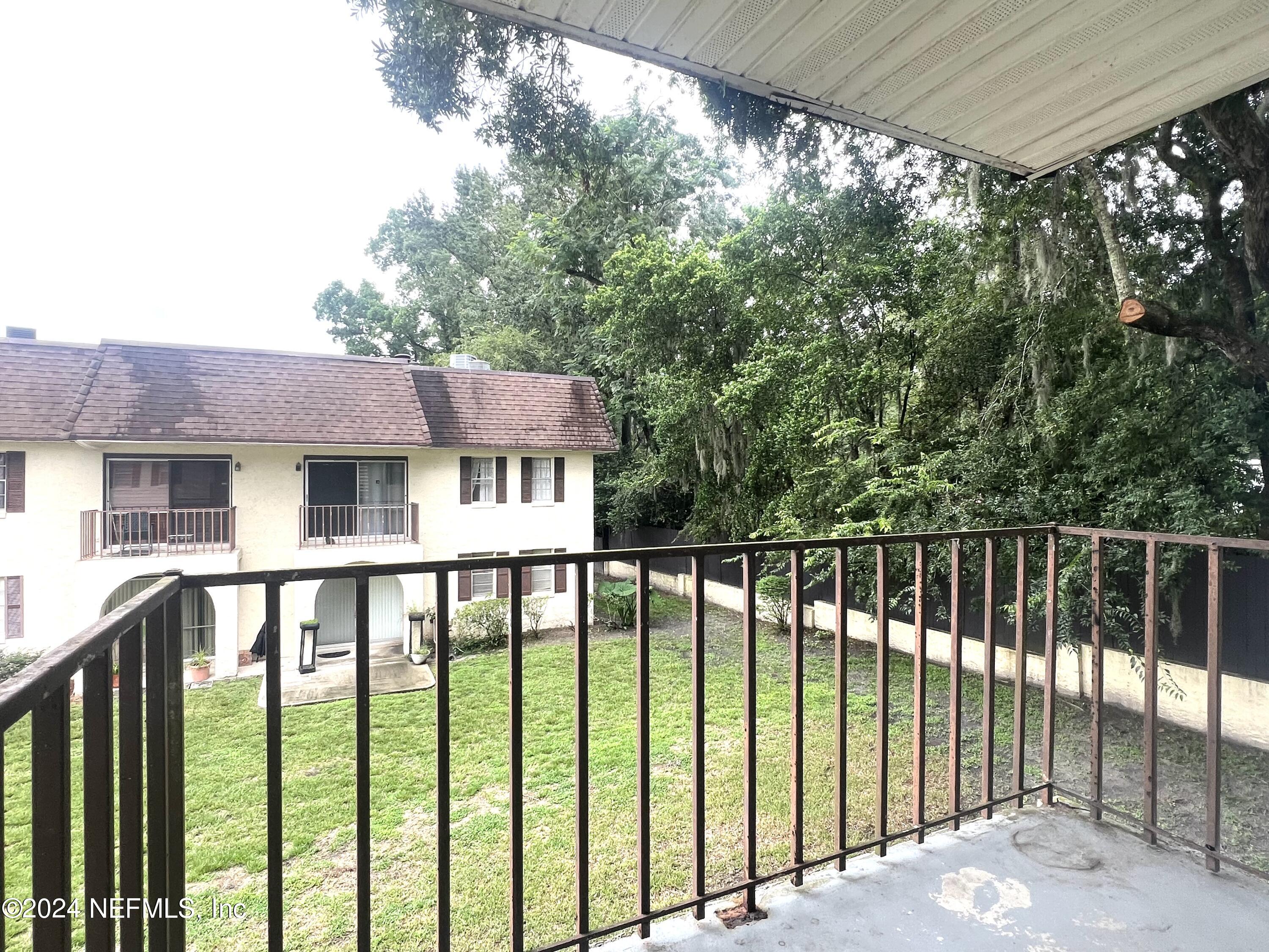 1631 El Prado Road, Unit 4 Jacksonville, FL 32216 - Photo 7 of 23 a view of a house with a balcony
