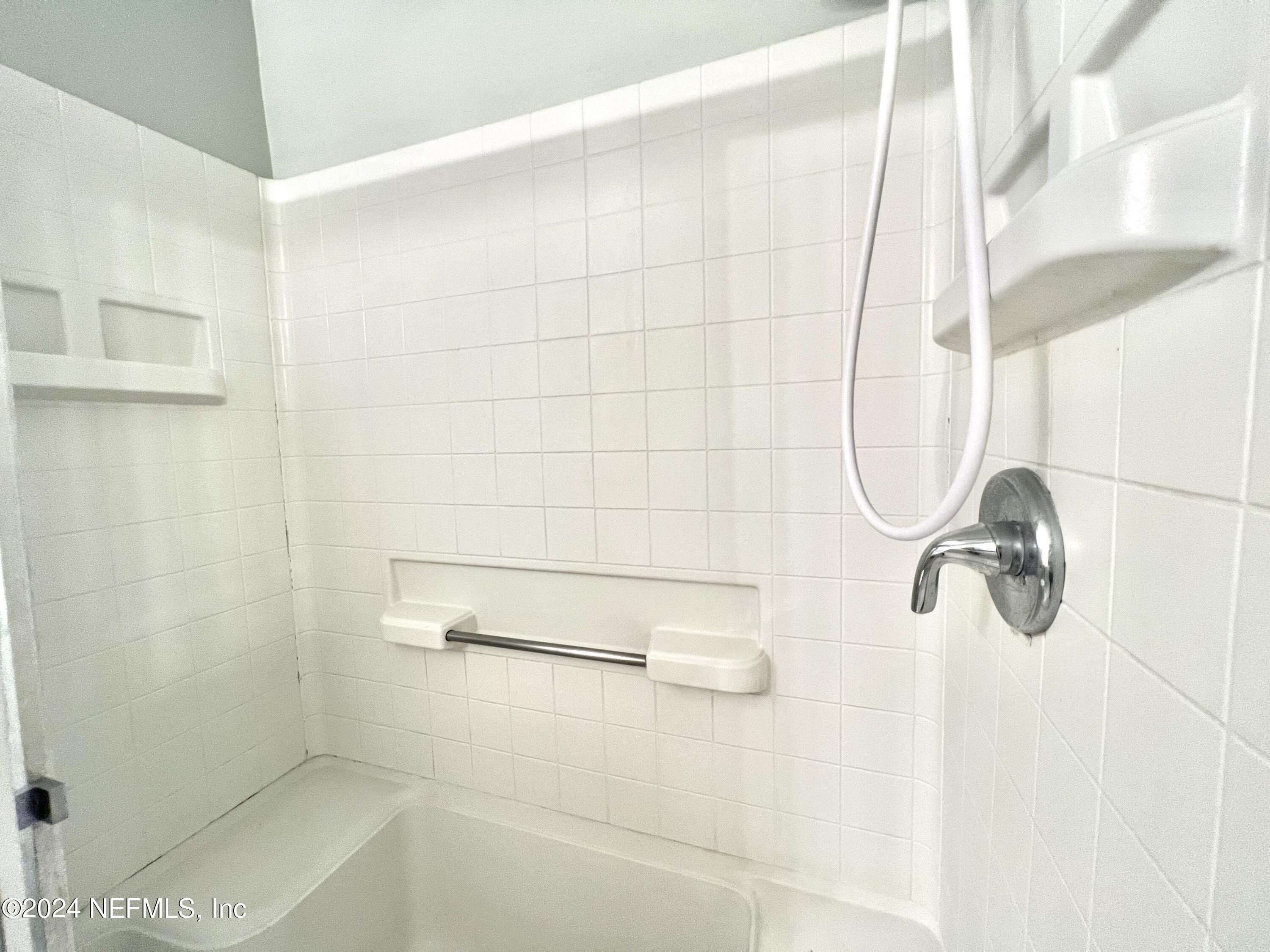 1631 El Prado Road, Unit 4 Jacksonville, FL 32216 - Photo 10 of 23 a bathroom with a shower