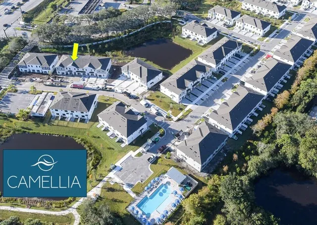 a picture of a bench in front of a wall