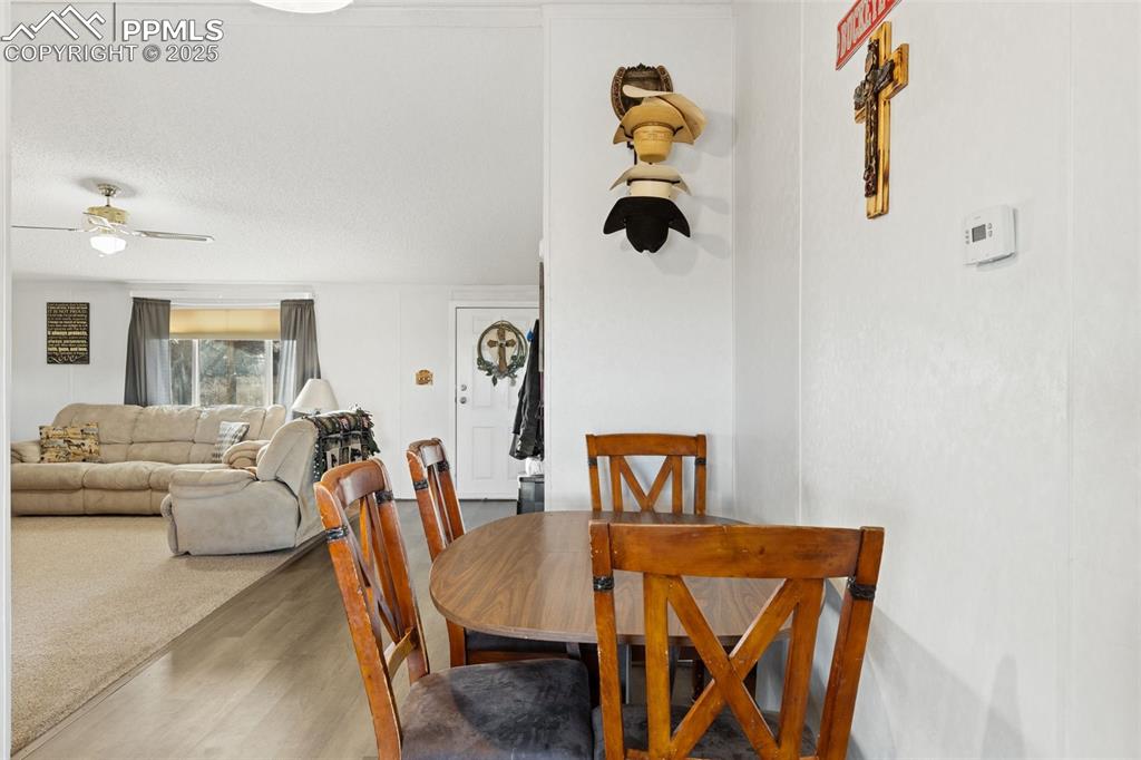 20480 Drennan Road Colorado Springs, CO 80928 - Photo 17 of 47 a living room with furniture and a table