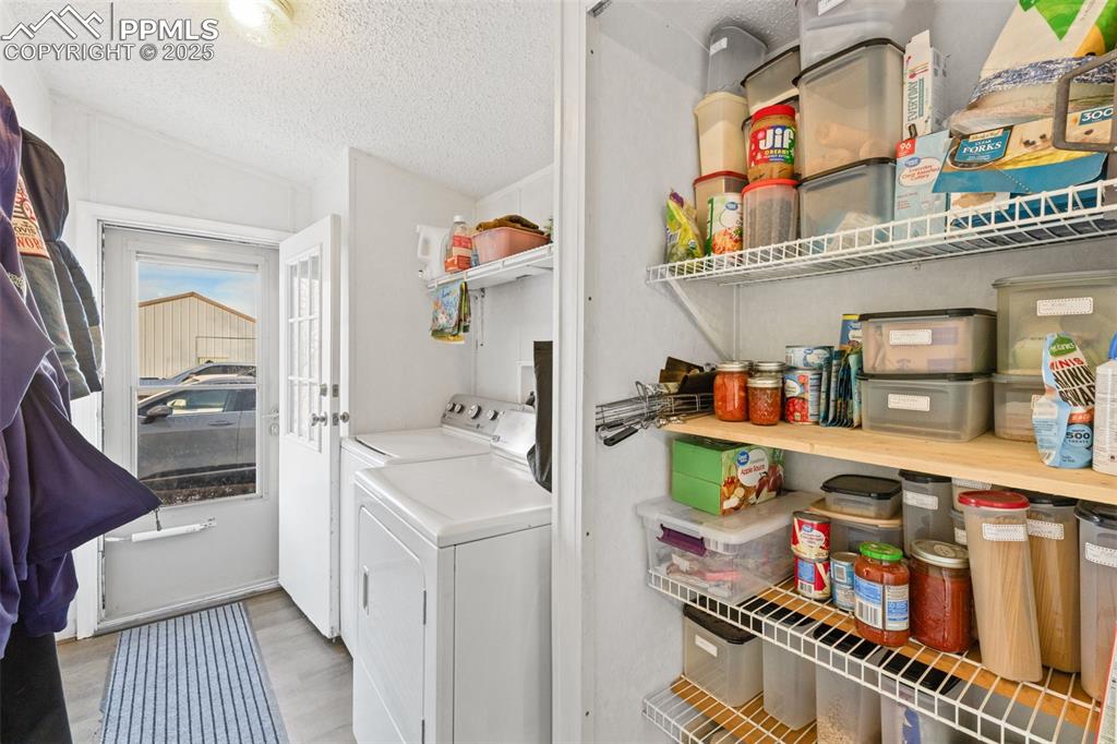 20480 Drennan Road Colorado Springs, CO 80928 - Photo 20 of 47 a utility room with dryer and washer