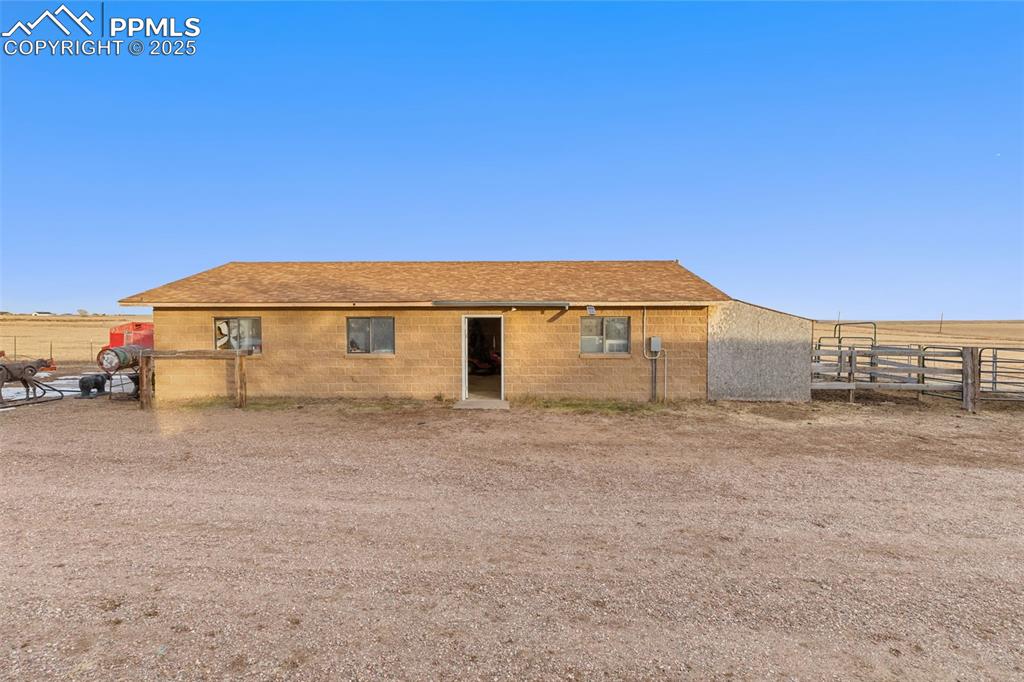 20480 Drennan Road Colorado Springs, CO 80928 - Photo 34 of 47 a blue house with a big yard