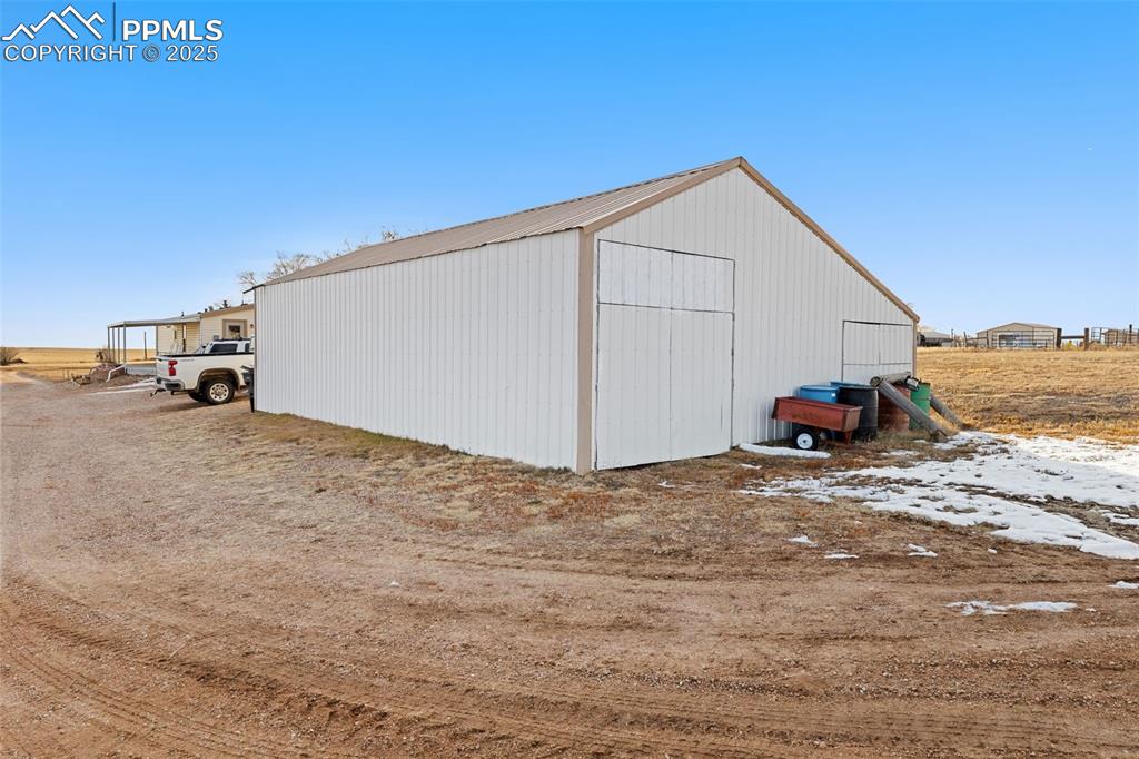20480 Drennan Road Colorado Springs, CO 80928 - Photo 37 of 47 a view of back yard of the house