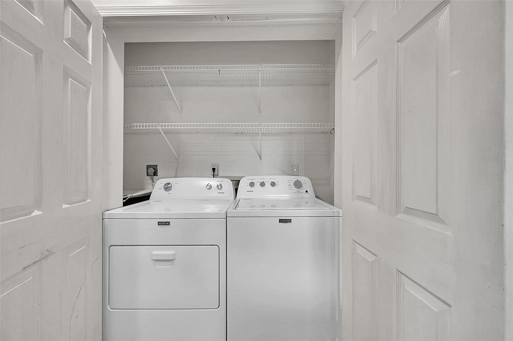 22299 Solitude Drive Boca Raton, FL 33428 - Photo 23 of 31 a utility room with dryer and washer