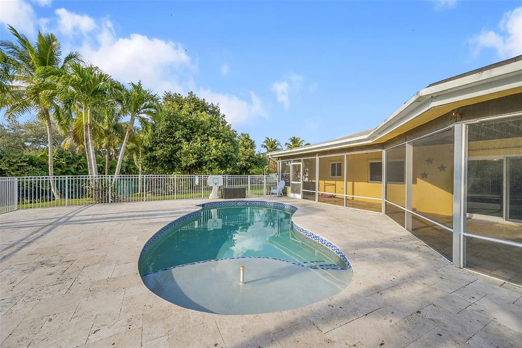 22299 Solitude Drive Boca Raton, FL 33428 - Photo 27 of 31 a view of a house with a swimming pool