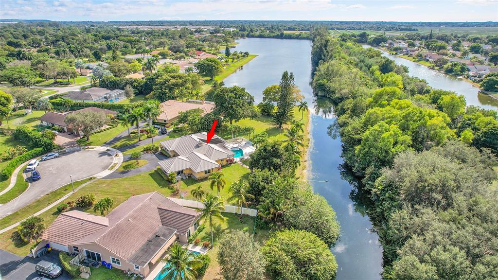 22299 Solitude Drive Boca Raton, FL 33428 - Photo 31 of 31 an aerial view of a house with a lake view