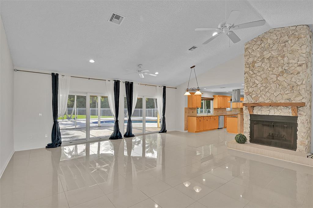 22299 Solitude Drive Boca Raton, FL 33428 - Photo 6 of 31 a view of kitchen with furniture and large window