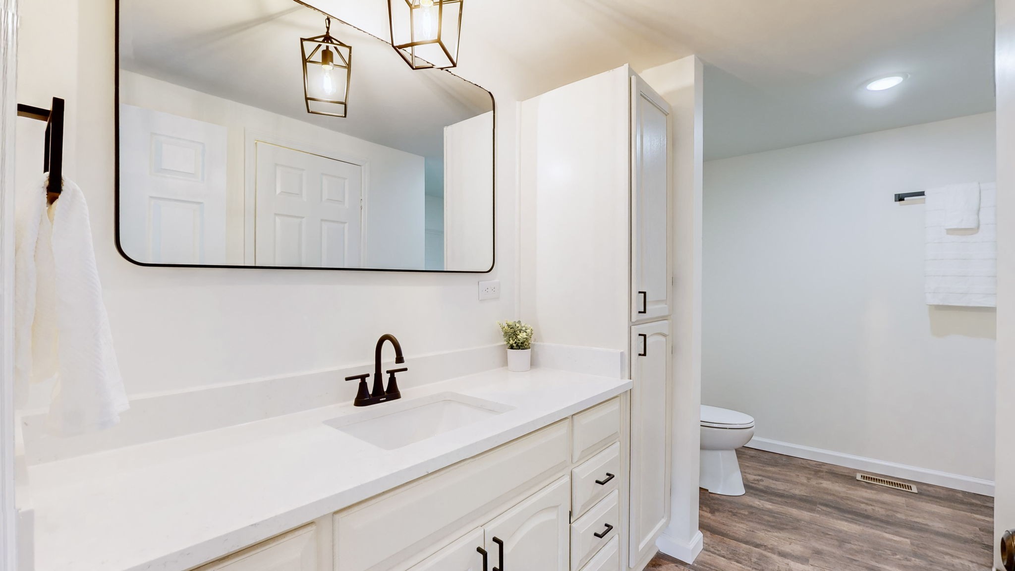 4452 William Woodard Road Springfield, TN 37172 - Photo 23 of 45 a bathroom with a sink a toilet and a mirror