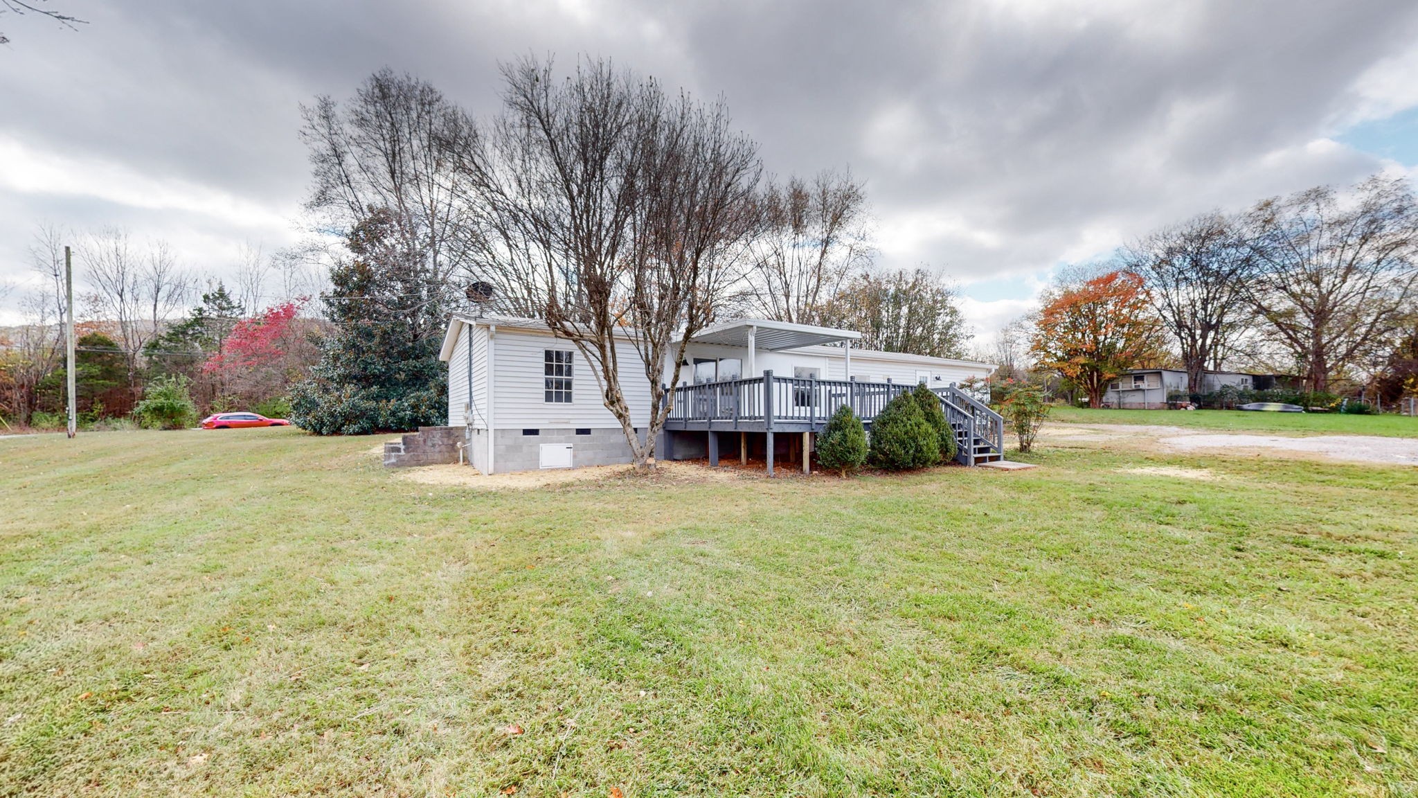 4452 William Woodard Road Springfield, TN 37172 - Photo 37 of 45 a view of a house with a yard and large trees