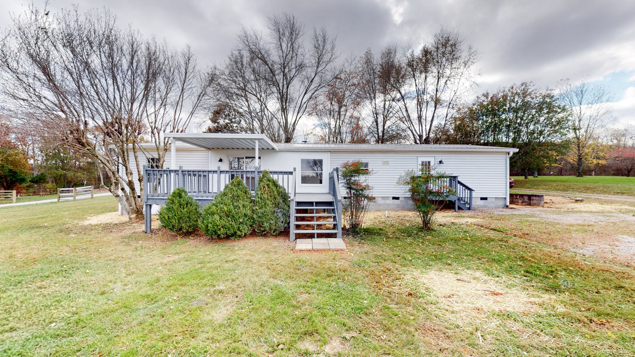 4452 William Woodard Road Springfield, TN 37172 - Photo 39 of 45 a view of a house with a yard and sitting area