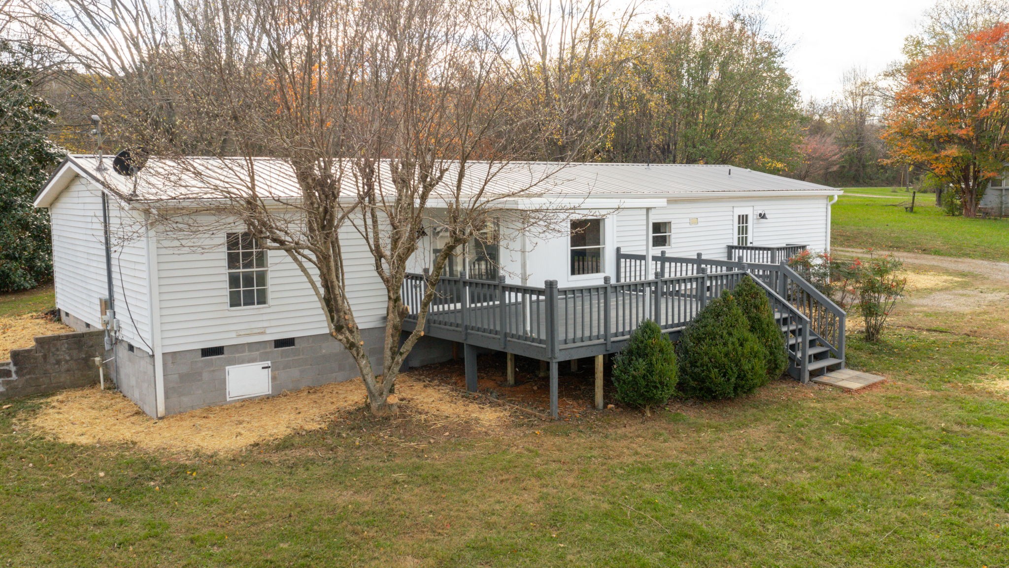 4452 William Woodard Road Springfield, TN 37172 - Photo 42 of 45 a view of a house with backyard and sitting area