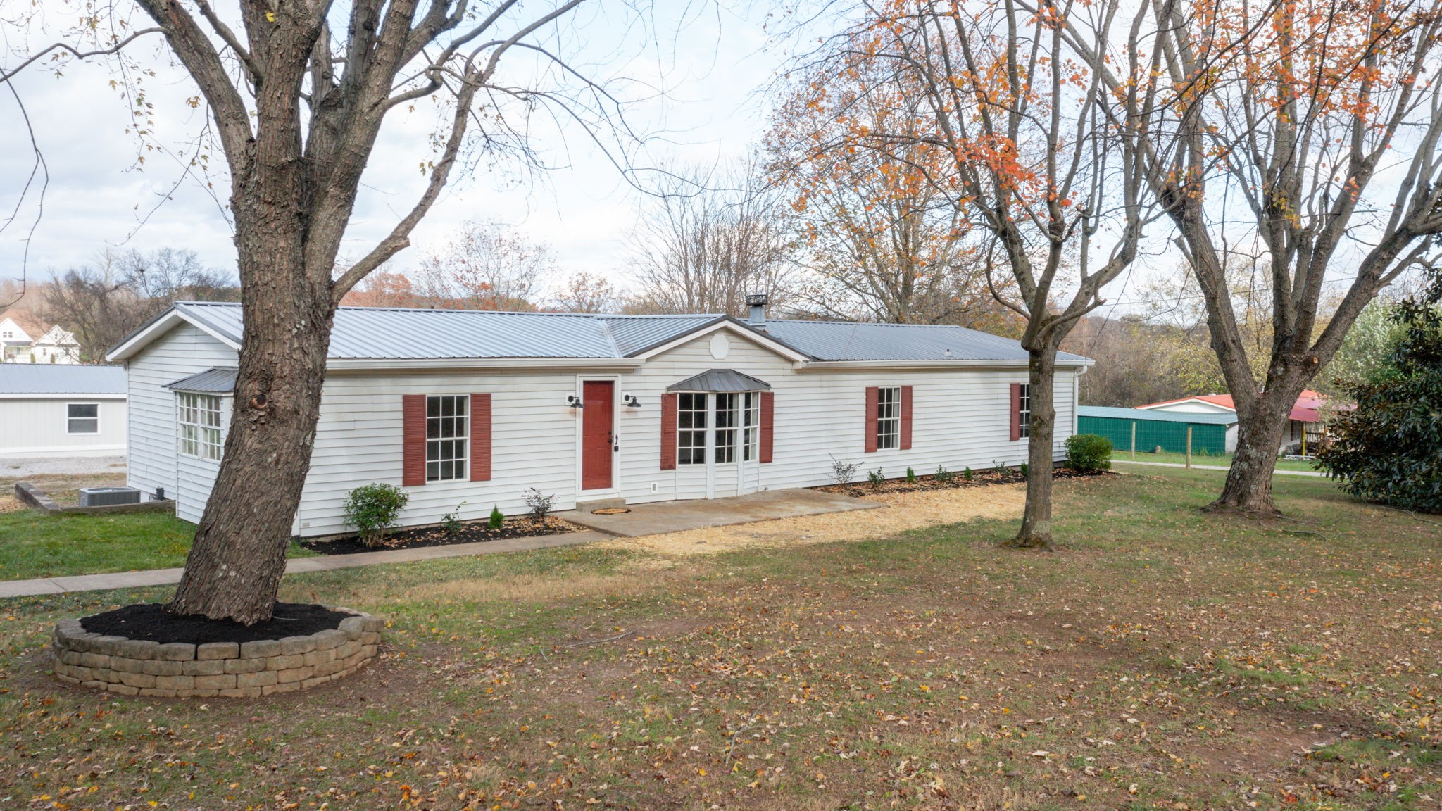 4452 William Woodard Road Springfield, TN 37172 - Photo 6 of 45 a front view of a house with a yard and trees