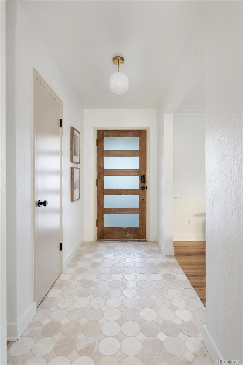 1617 Wolff Street Denver, CO 80204 - Photo 12 of 38 a view of an empty room with a window