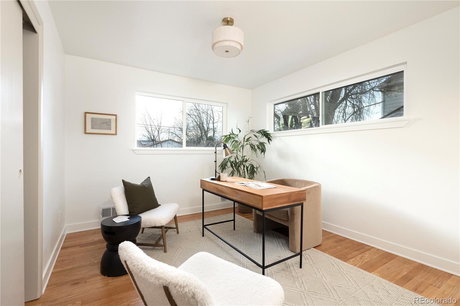 1617 Wolff Street Denver, CO 80204 - Photo 23 of 38 a view of a livingroom with furniture and window