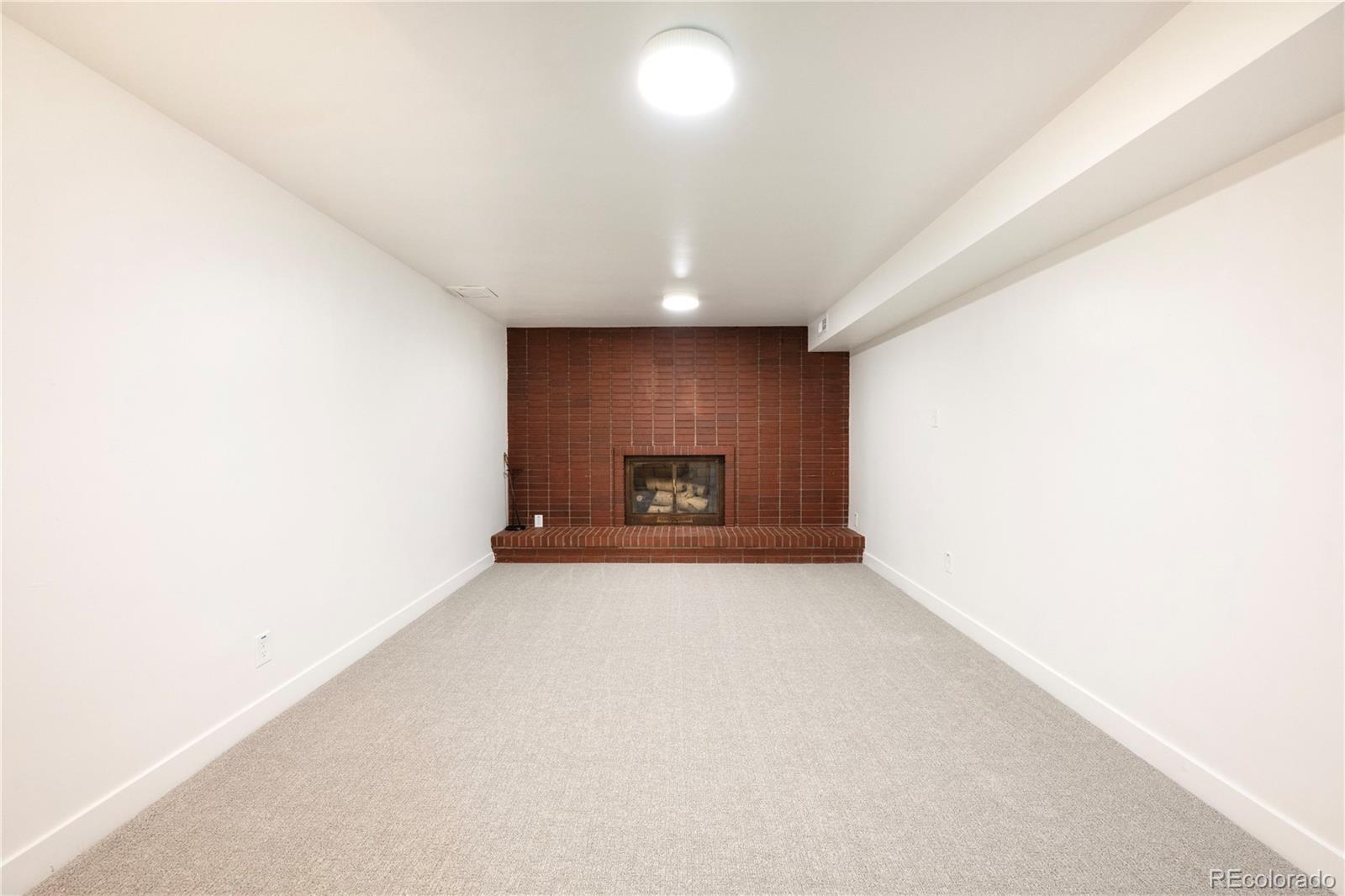1617 Wolff Street Denver, CO 80204 - Photo 26 of 38 a view of wooden floor and window in a room