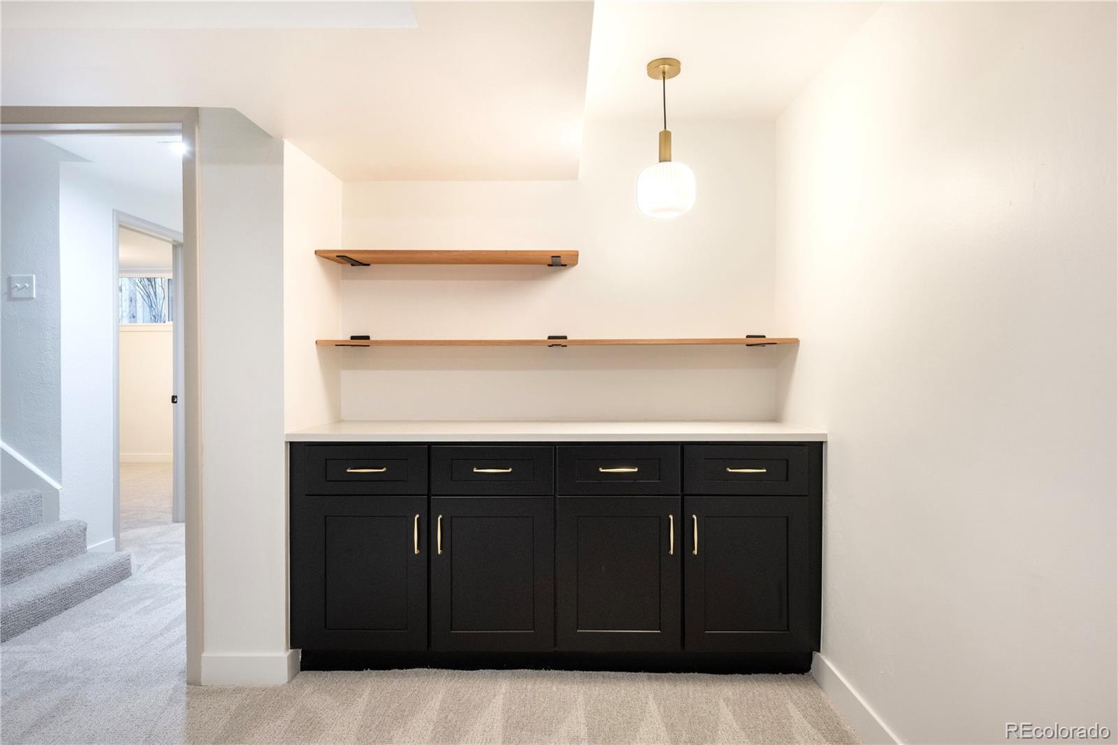 1617 Wolff Street Denver, CO 80204 - Photo 28 of 38 a bathroom with a sink and a mirror