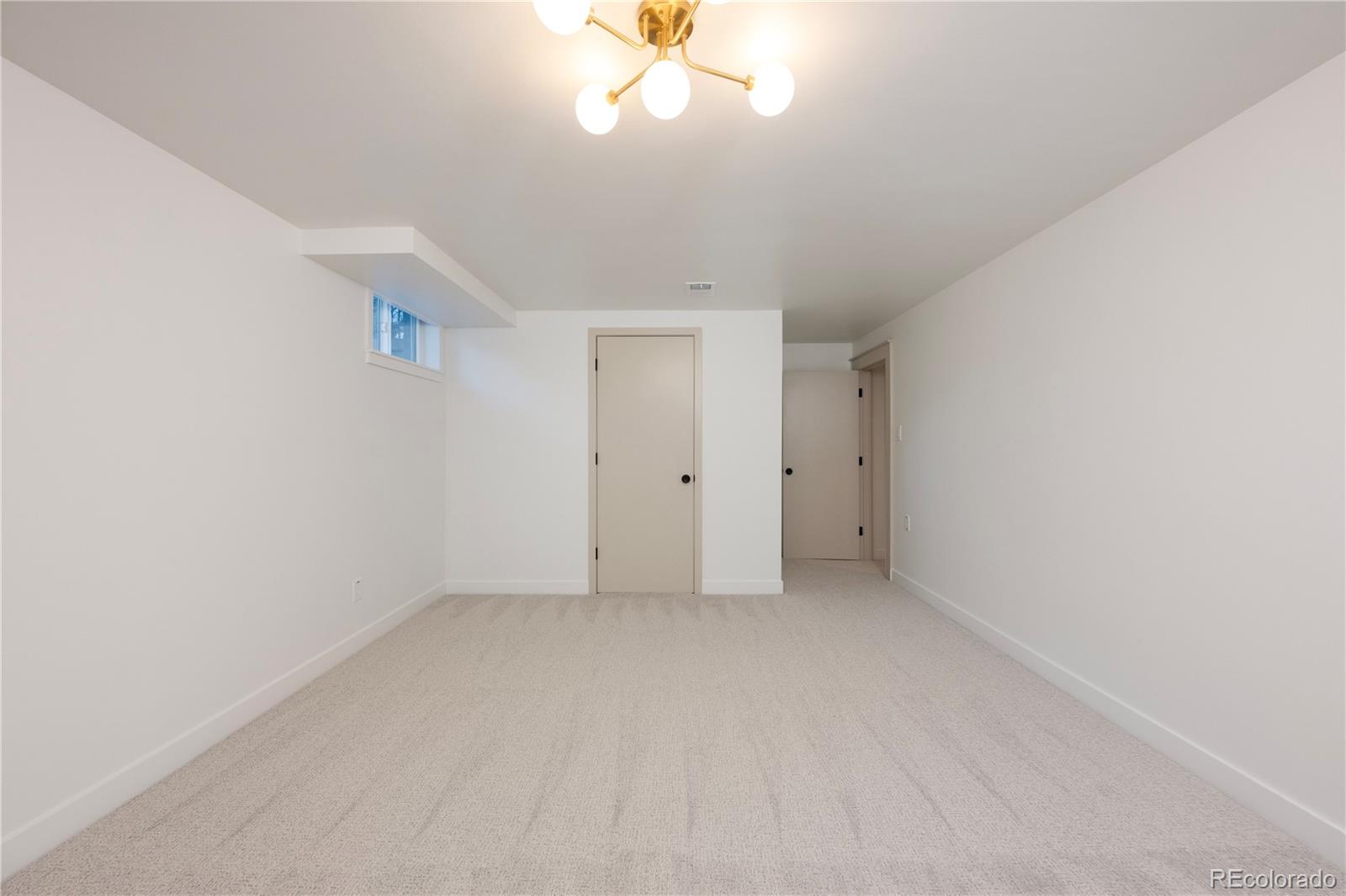 1617 Wolff Street Denver, CO 80204 - Photo 29 of 38 a view of an empty room with a window