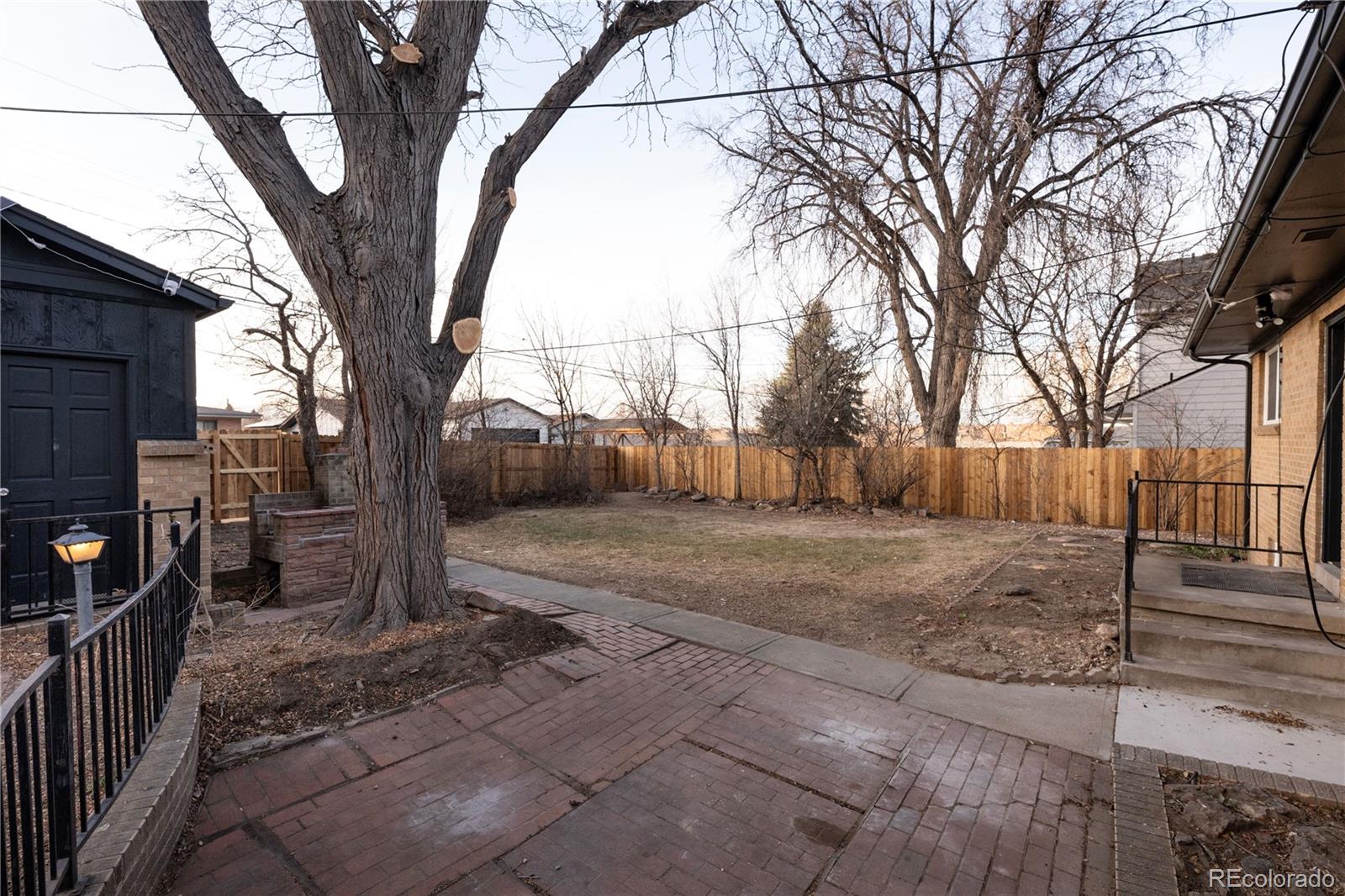 1617 Wolff Street Denver, CO 80204 - Photo 33 of 38 a view of a yard with large trees