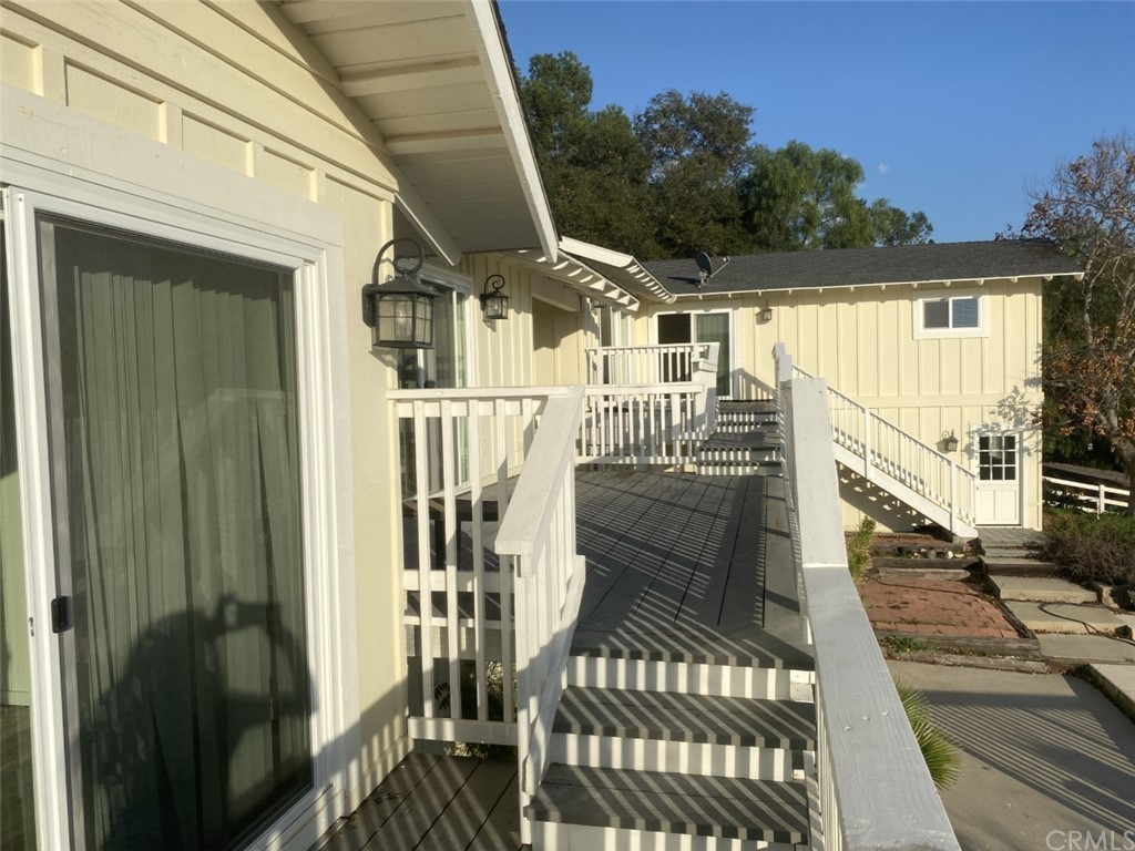 2710 Los Alisos Drive Fallbrook, CA 92028 - Photo 2 of 13 a view of a balcony with wooden floor