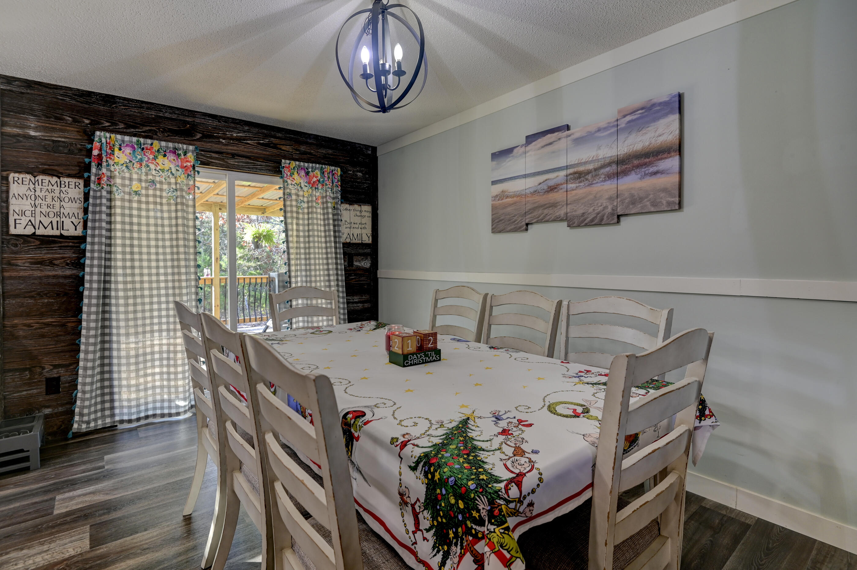 5256 Mt Olive Road Crestview, FL 32539 - Photo 15 of 68 a view of a dining room with furniture window and wooden floor