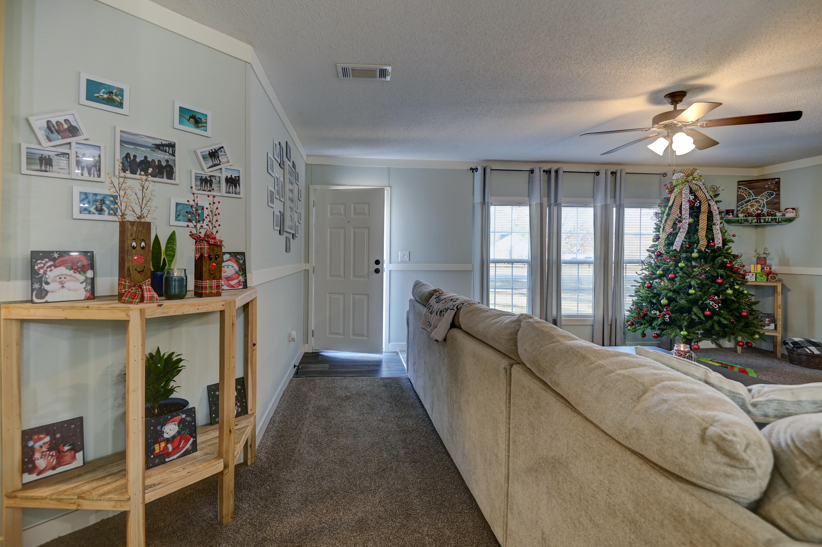 5256 Mt Olive Road Crestview, FL 32539 - Photo 19 of 68 a living room with furniture and a window