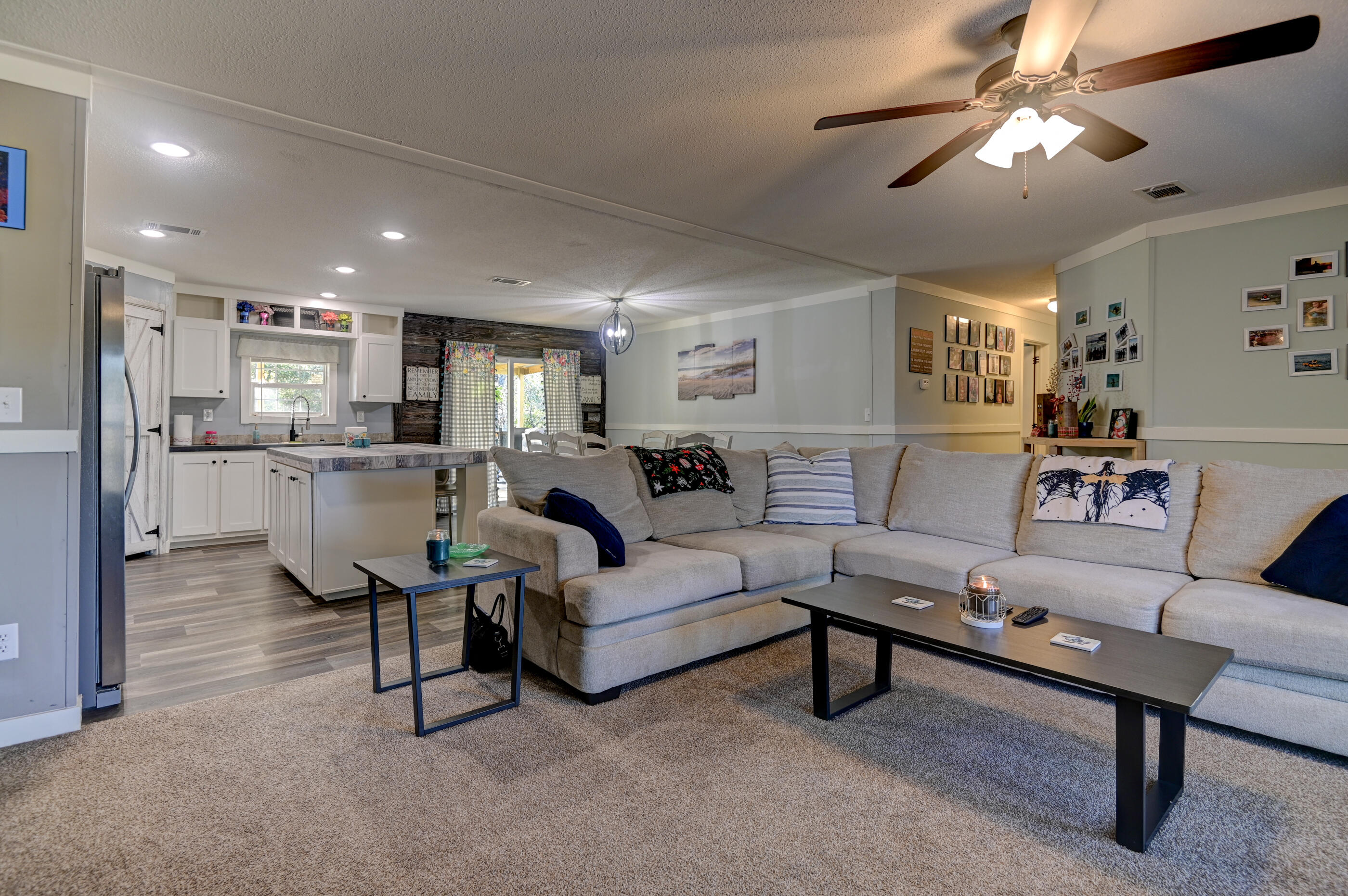 5256 Mt Olive Road Crestview, FL 32539 - Photo 22 of 68 a living room with furniture and kitchen view