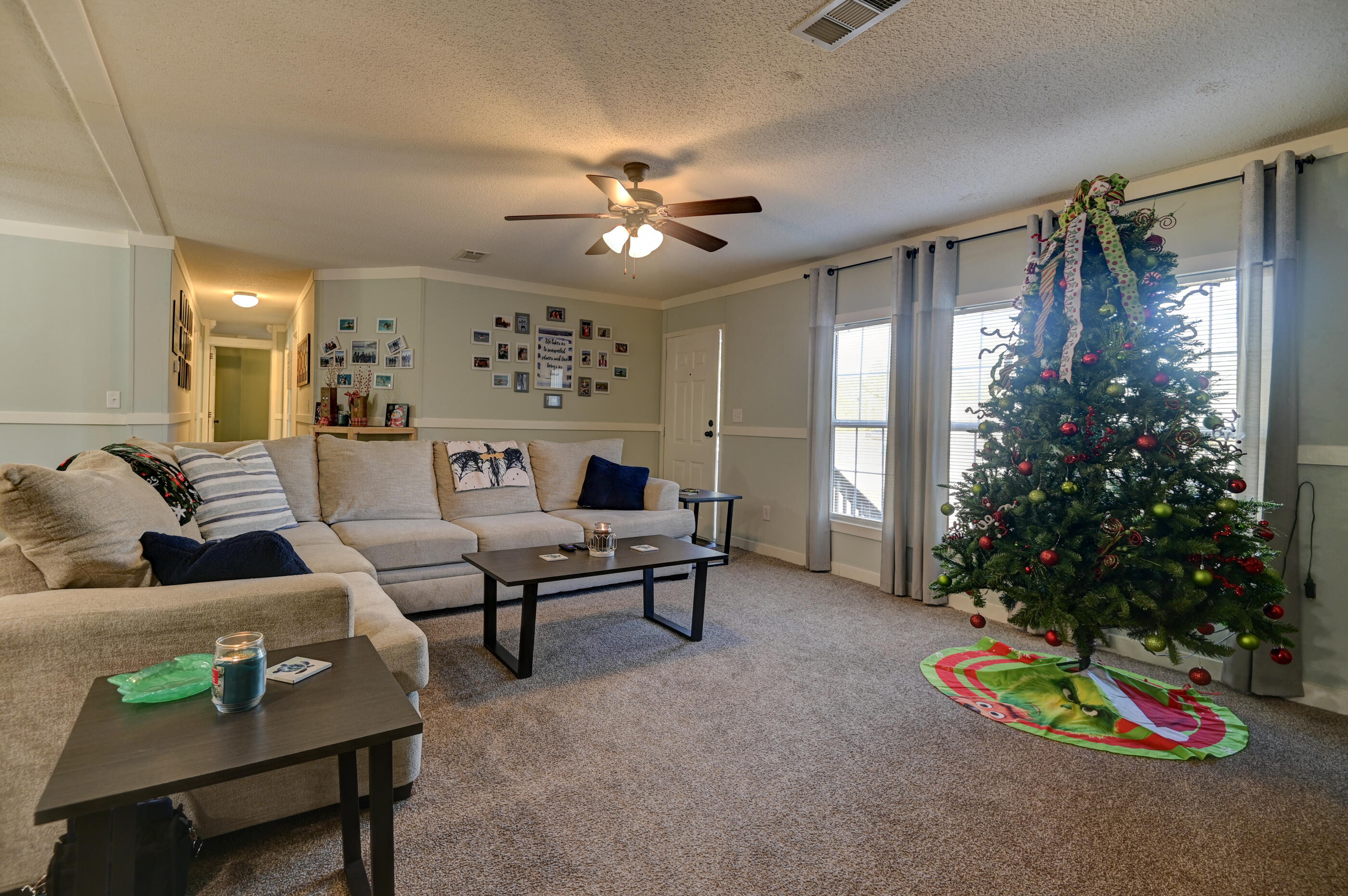 5256 Mt Olive Road Crestview, FL 32539 - Photo 25 of 68 a living room with furniture and flowers