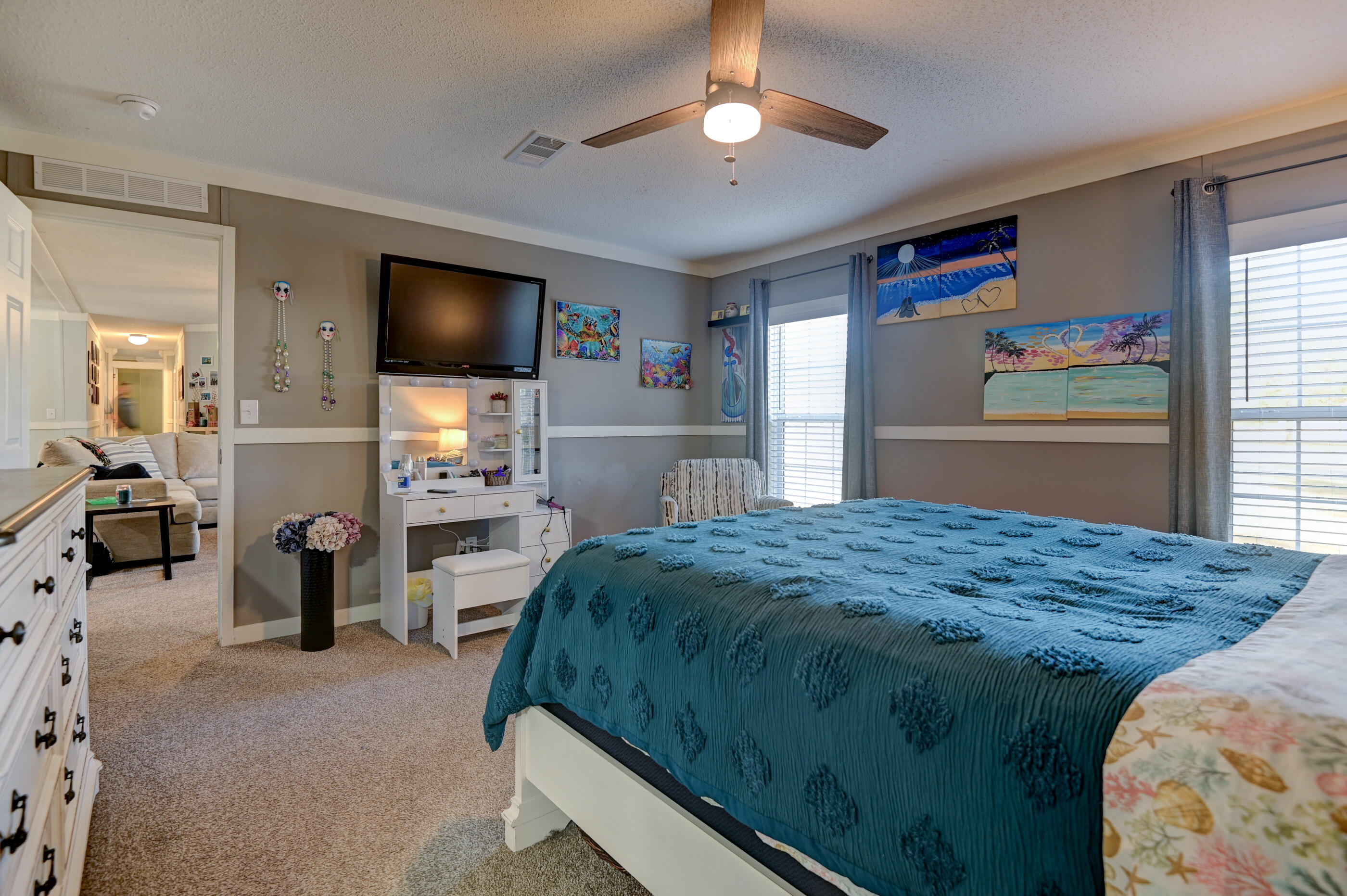 5256 Mt Olive Road Crestview, FL 32539 - Photo 31 of 68 a bedroom with furniture and a flat screen tv