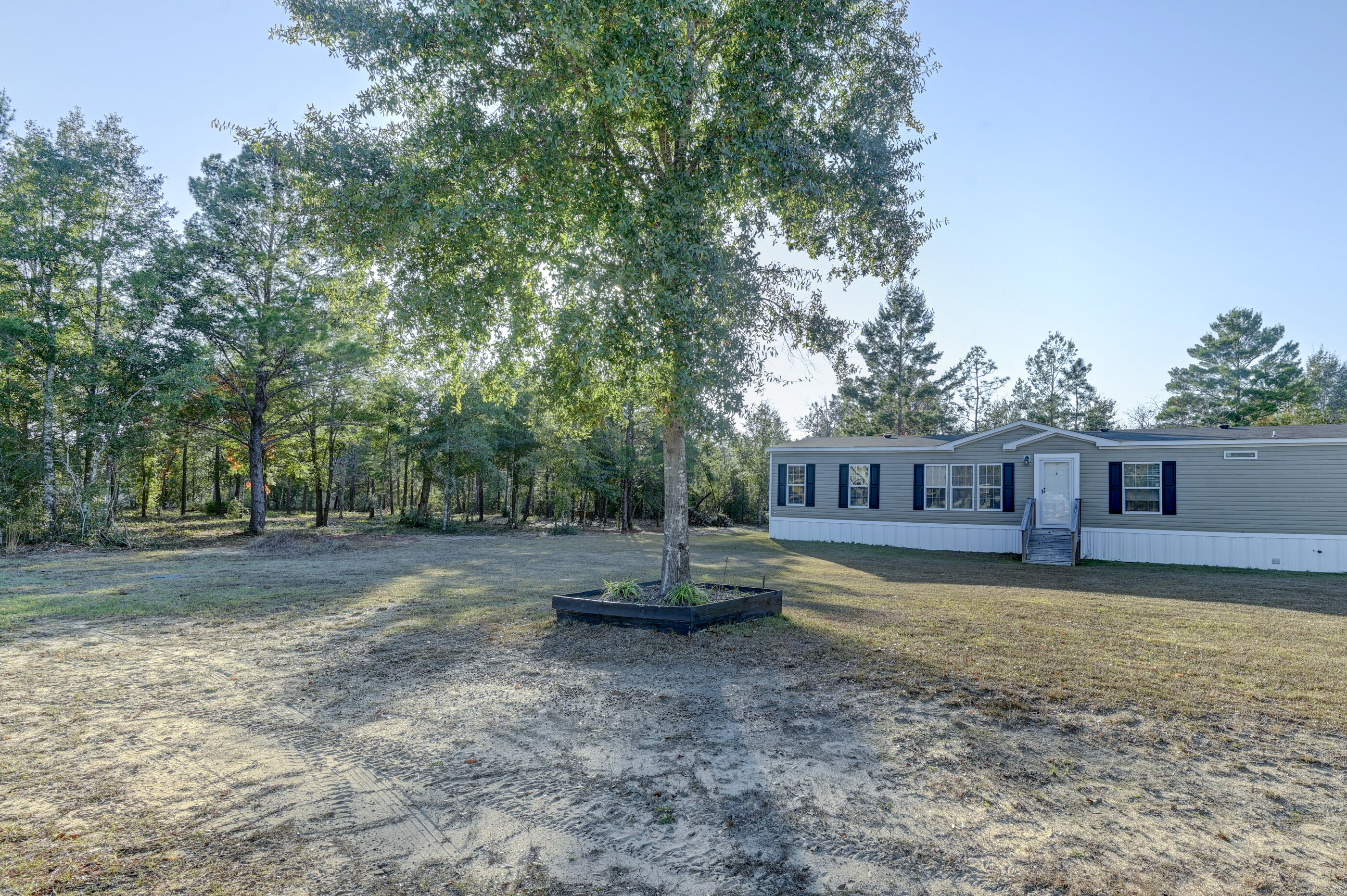 5256 Mt Olive Road Crestview, FL 32539 - Photo 67 of 68 a view of a house with a yard