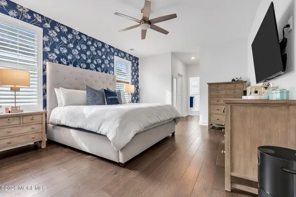 a bedroom with a bed and a table