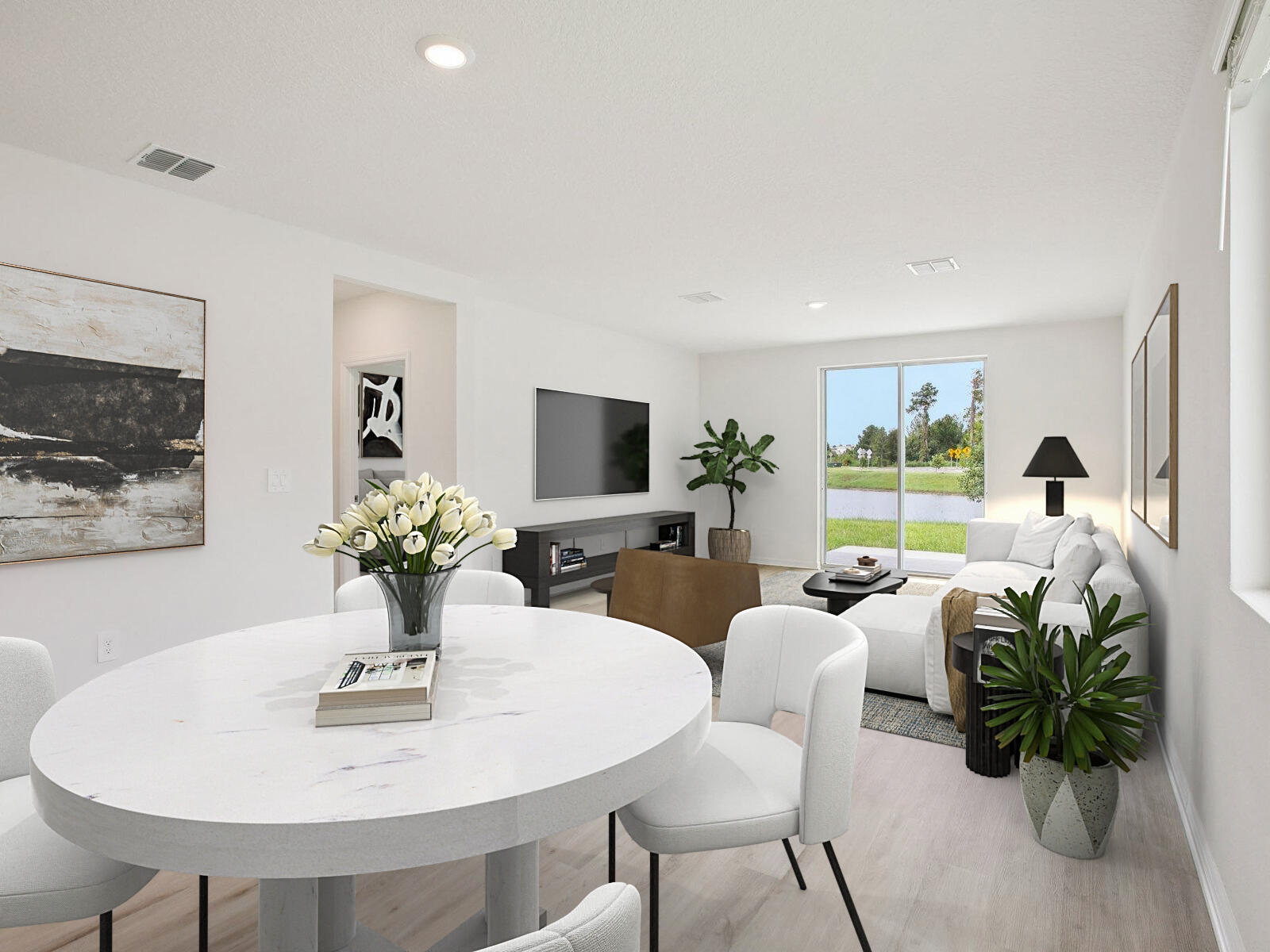 14418 Southwest New Dawn Road Indiantown, FL 34956 - Photo 11 of 16 a living room with furniture potted plant and a table