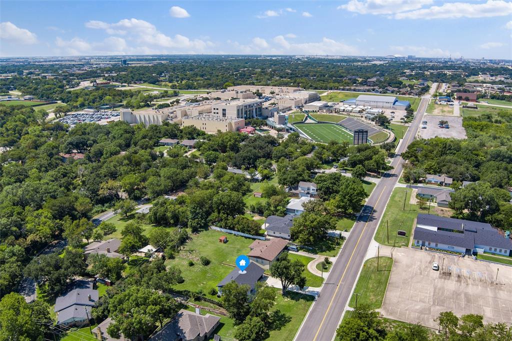 421 East Tarrant Road Grand Prairie, TX 75050 - Photo 9 of 32 Aerial overview of property's location with a tree filled landscape