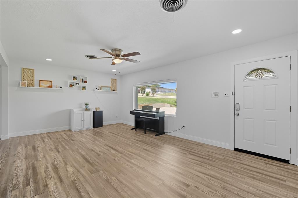 421 East Tarrant Road Grand Prairie, TX 75050 - Photo 10 of 32 Entryway featuring recessed lighting, light wood-type flooring, and a ceiling fan