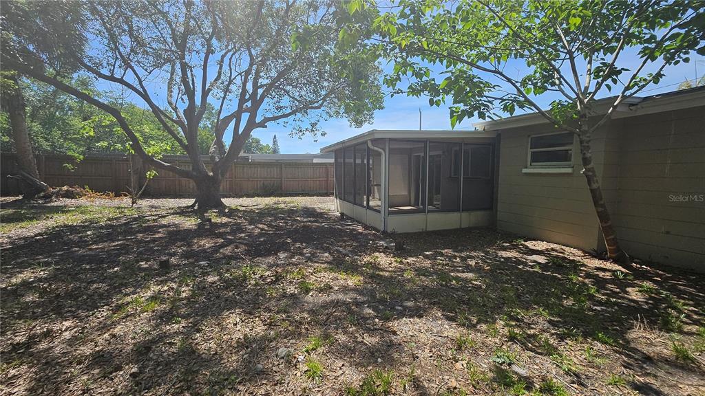 6412 Pawling Avenue Port Richey, FL 34668 - Photo 21 of 24 a backyard of a house