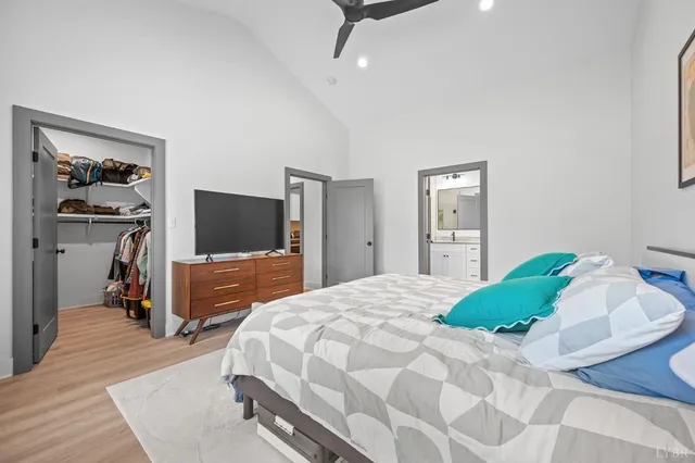 a bathroom with a granite countertop sink mirror and double