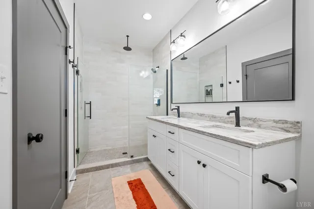 a living room with furniture and a rug